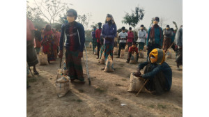 আদিবাসীদের মাঝে ত্রাণ সামগ্রী ও শিক্ষার্থীদের মাঝে শিক্ষা উপকরণ বিতরণ